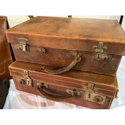 52 - A BOX OF LEATHER DOCUMENT CASES AND SUIT CASES