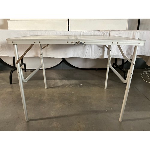 57 - A FOLDING TABLE