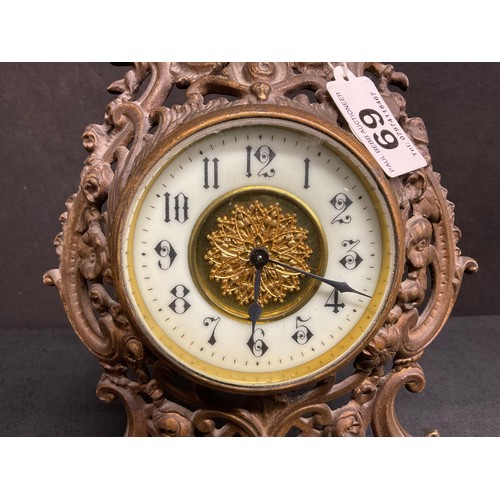 69 - A DECORATIVE BRASS MANTLE CLOCK H11