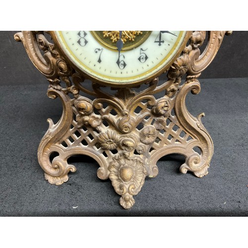 69 - A DECORATIVE BRASS MANTLE CLOCK H11