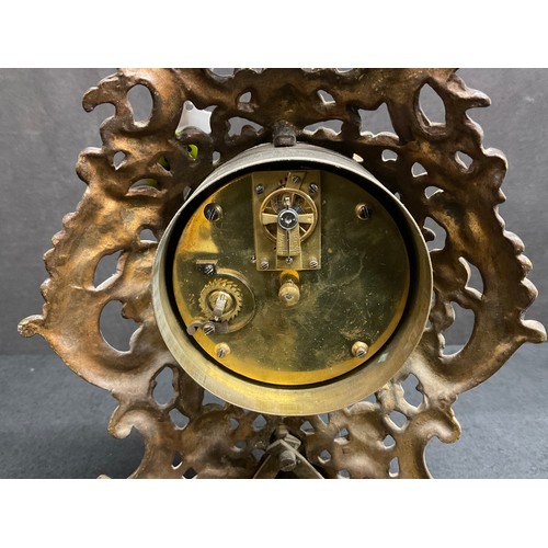 69 - A DECORATIVE BRASS MANTLE CLOCK H11