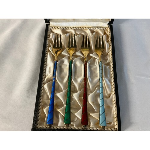 77 - A CASED SET OF DANISH SILVER ENAMEL PICKLE FORKS MARKED 925