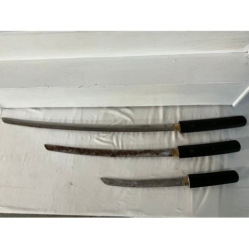 98 - THREE REPRODUCTION JAPANESE SWORDS