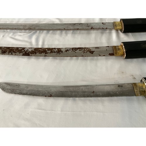 98 - THREE REPRODUCTION JAPANESE SWORDS