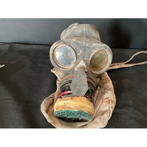 103 - VINTAGE GAS MASK, RAF EMBROIDERED HANKERCHIEF, TIN OF MILITARY BUTTONS ETC AND A VINTAGE GIRL GUIDES... 