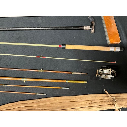 124 - TWO VINTAGE FISHING RODS TO INCLUDE A WALBRAN VINTAGE EXAMPLE, A CENTRE PIN REEL, A HALLMARKED SILVE... 