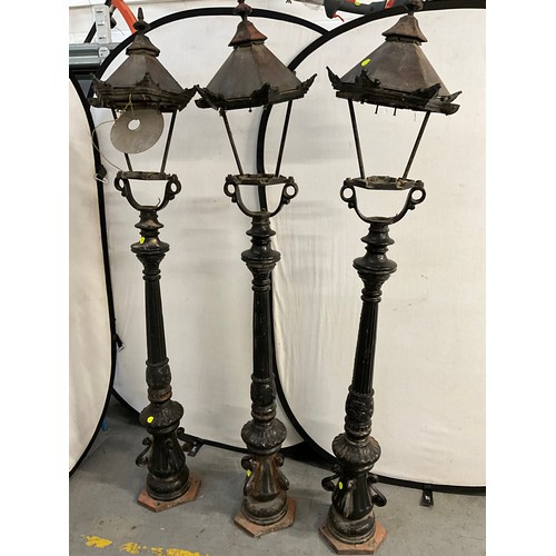 413 - 3 CAST IRON GARDEN LAMPS WITH COPPER TOPS H74”