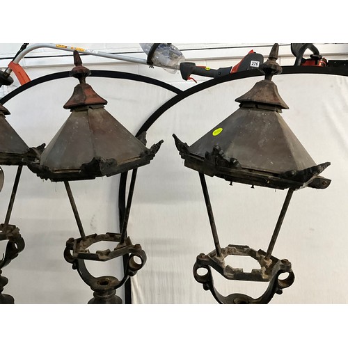 413 - 3 CAST IRON GARDEN LAMPS WITH COPPER TOPS H74”