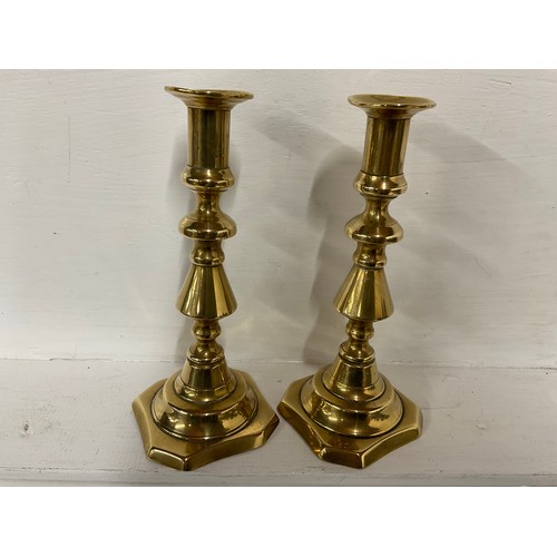 24 - LARGE EARLY BRASS JAM PAN A SMALLER EXAMPLE A BRASS SHELL CASE VICTORIAN BRASS CANDLESTICKS