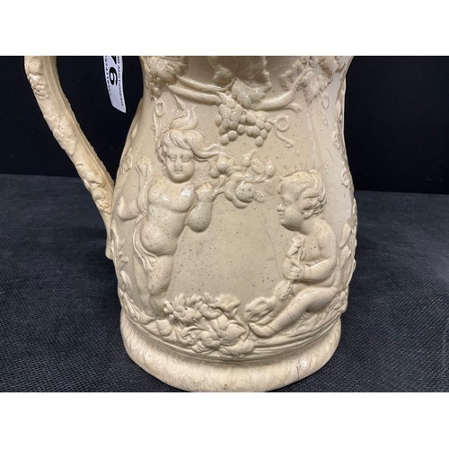 76 - EARLY VICTORIAN CREAMWARE JUG DECORATED WITH CHERUBS AND FOLIGE H8