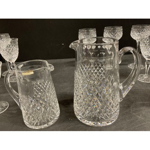 143 - BOX OF CUT GLASS, SETS OF GLASSES AND TWO MATCHING WATER JUGS 26 PIECES