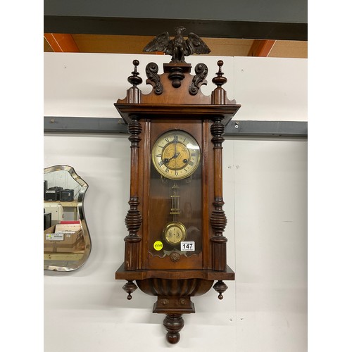 147 - VICTORIAN SPRING VIENNA WALL CLOCK COMPLETE WITH KEY AND PENDULUM - EAGLE FINIAL TO TOP. HEIGHT: 35