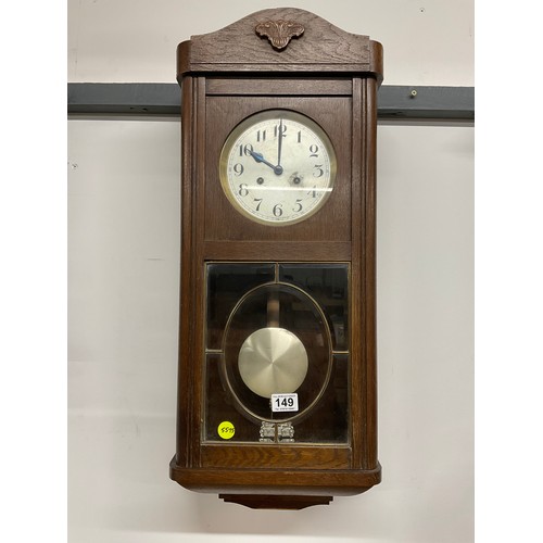 149 - VINTAGE OAK CASED WALL CLOCK COMPLETE WITH KEY AND PENDULUM H 30