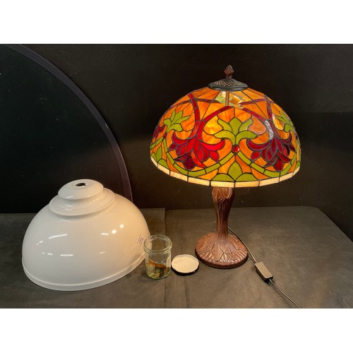 150 - TABLE LAMP WITH TIFFANY STYLE SHADE (BROKEN) AND AN ENAMEL REPRODUCTION LAMP SHADE