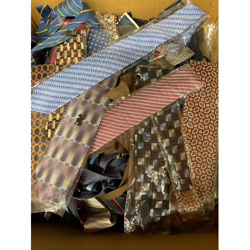 210 - BOX OF ASSORTED TIES - SOME NEW IN SEALED PACKAGING. MAINLY SILK