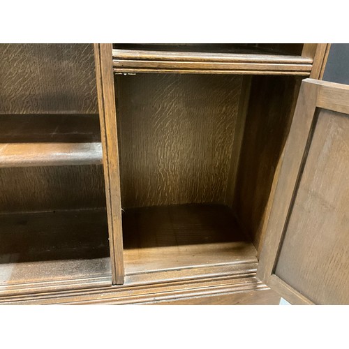 385 - VINTAGE OAK BOOKCASE PRIRARY STYLE WITH LINEN FOLD DESIGN TO DOOR H35