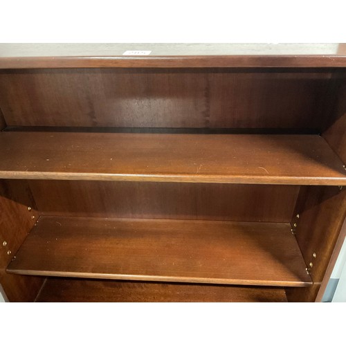 285 - STAG MAHOGANY WATERFALL BOOKCASE WITH DRAWER TO BASE H44