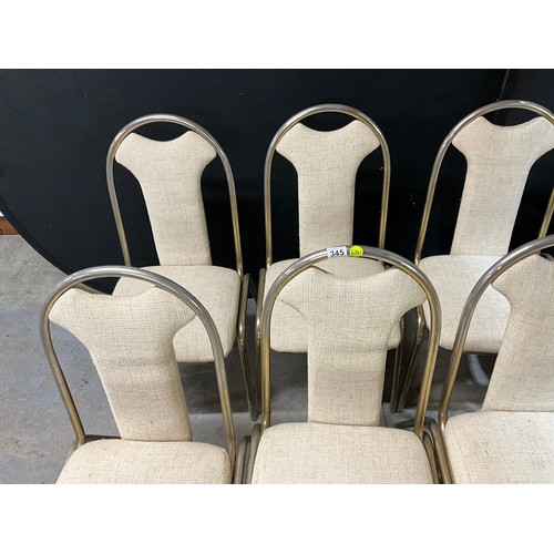 345 - 21 METAL STACKING CHAIR WITH FABRIC UPHOLSTERED SEAT AND BACK PANEL