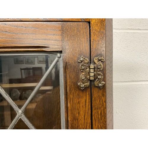 317 - OAK PRIORY STYLE FLOOR STANDING LEADED GLASS CORNER CABINET H72