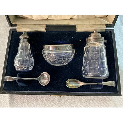 119 - HALLMARKED SILVER RIMMED CRUET SET IN ORIGINAL CASE