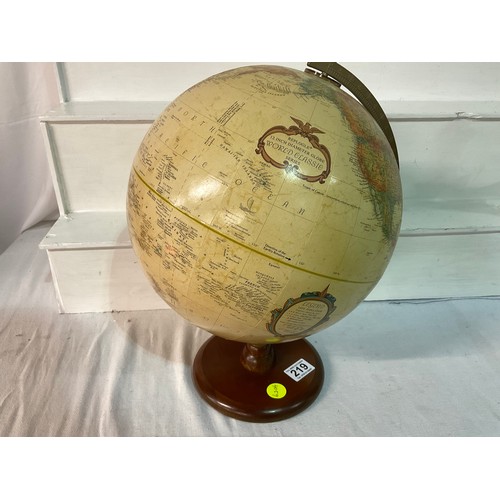 219 - VINTAGE WORLD GLOBE ON A WOODEN BASE H17” D12”