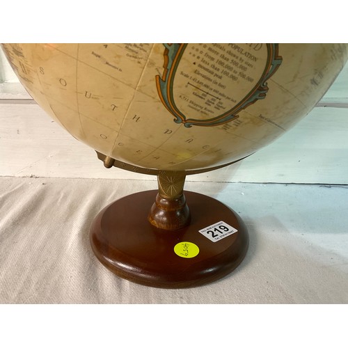 219 - VINTAGE WORLD GLOBE ON A WOODEN BASE H17” D12”