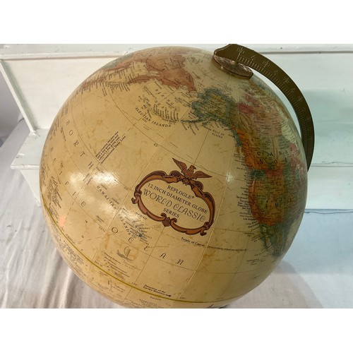 219 - VINTAGE WORLD GLOBE ON A WOODEN BASE H17” D12”