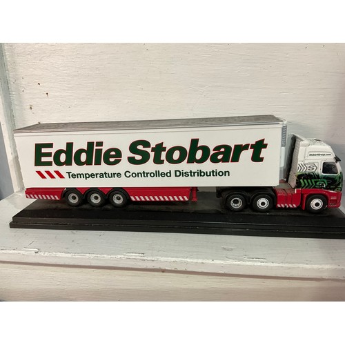 132 - QTY OF EDDIE STOBART MODEL LORRIES AND POCKET WATCH ETC