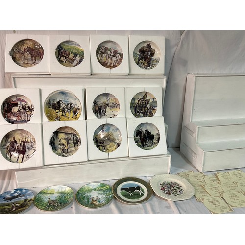 212 - ELEVEN BOXED WEDGWOOD COLLECTOR PLATES 