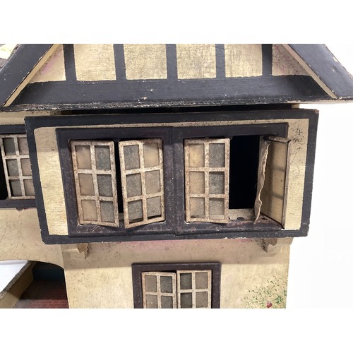 227 - VINTAGE WOODEN DOLLS HOUSE COMPLETE WITH FIGURES AND FURNITURE