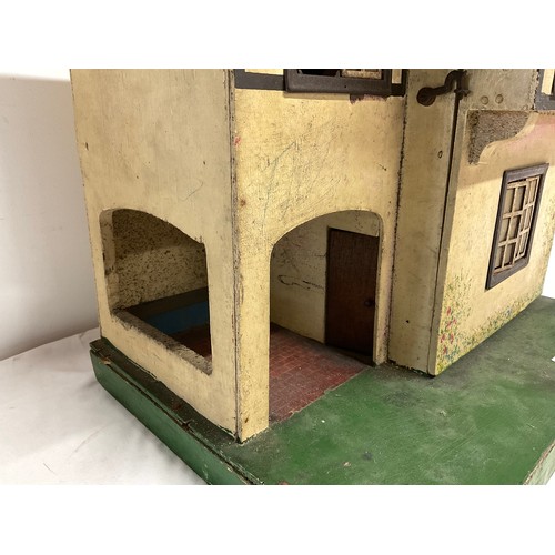 227 - VINTAGE WOODEN DOLLS HOUSE COMPLETE WITH FIGURES AND FURNITURE