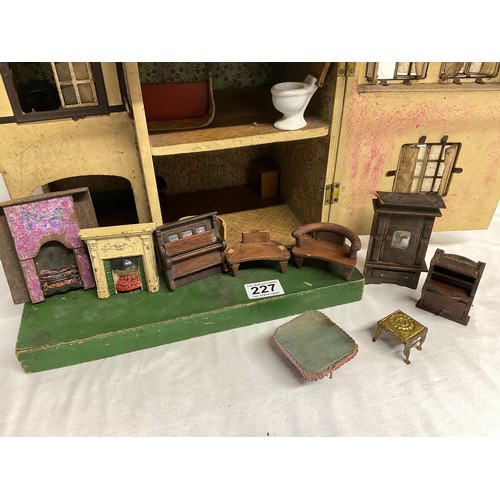 227 - VINTAGE WOODEN DOLLS HOUSE COMPLETE WITH FIGURES AND FURNITURE