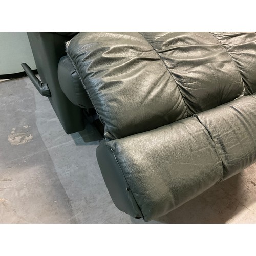 342 - GREEN LEATHER ROCKING AND RECLINING ARMCHAIR