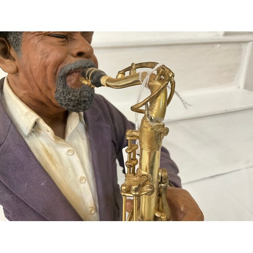 6 - CERAMIC SAXOPHONE FIGURE SIGN TO BACK