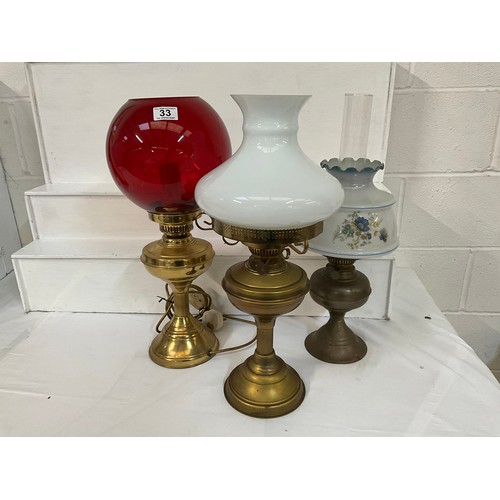 33 - 2 BRASS OIL LAMPS AND A ELECTRIC EXAMPLE H21”