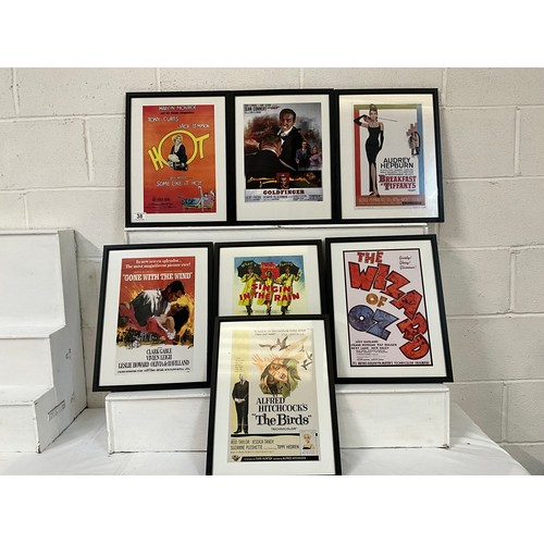 38 - 7 FRAMED FILM ADVERTISING POSTERS 17”X13”