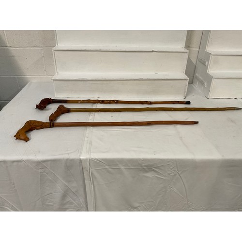 71 - 3 CARVED HORSES HANDLED WALKING CANES