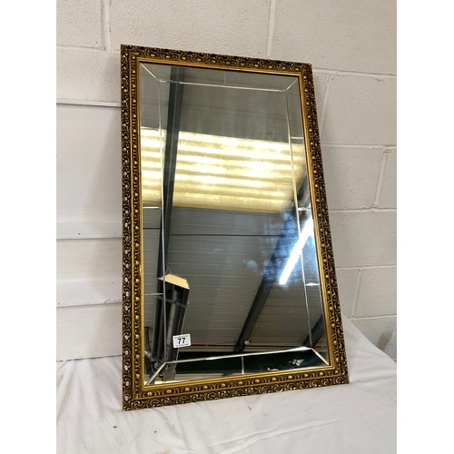 77 - MODERN GILT FRAMED WALL MIRROR WITH ENGRAVED DECORATION 35”X21”