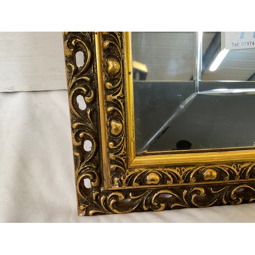 77 - MODERN GILT FRAMED WALL MIRROR WITH ENGRAVED DECORATION 35”X21”