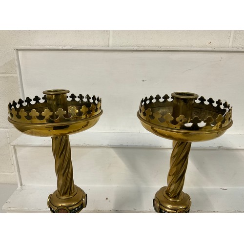 90 - PAIR OF LARGE BRASS RELIGOUS ATLAR CANDLESTICKS WITH TWISTED STEMS AND RISEN ON LIONS PAW FEET H22”