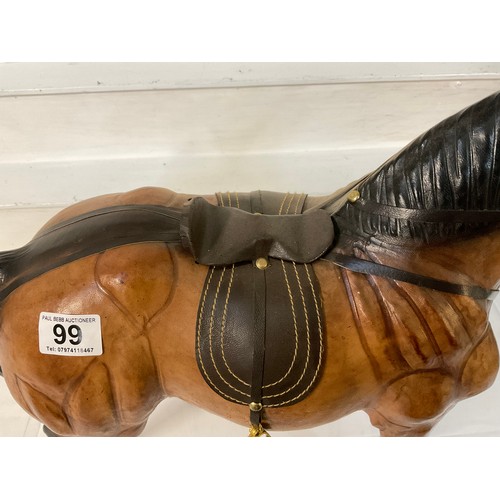 99 - LEATHER HORSE COMPLETE WITH SADDLE H21” L24”