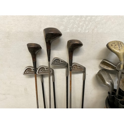 126 - QTY OF GOLF CLUBS AND BAG H46”