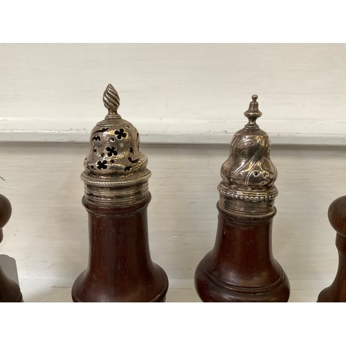 144 - 2 PAIRS OF TREEN CRUETS WITH HALLMARKED SILVER MOUNTS