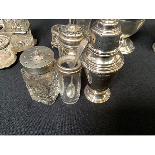 148 - 2 HALLMARKED SILVER CRUETS, 3 HALLMARKED SILVER SALT AND PEPPER POTS AND HALLMARKED SILVER CUP