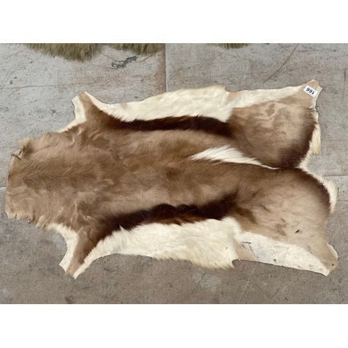 166 - 3 FUR RUGS AND A ANIMAL SKIN EXAMPLE