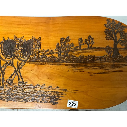 222 - PINE COFFEE TABLE WITH CARVING TO TOP OF HORSES PLOUGHING A FIELD L34” H15” D14”