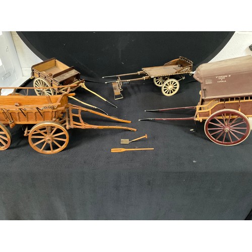 175 - 4 MODEL WOODEN HORSE DRAWN CARTS