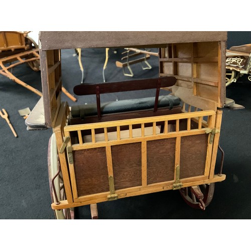 175 - 4 MODEL WOODEN HORSE DRAWN CARTS