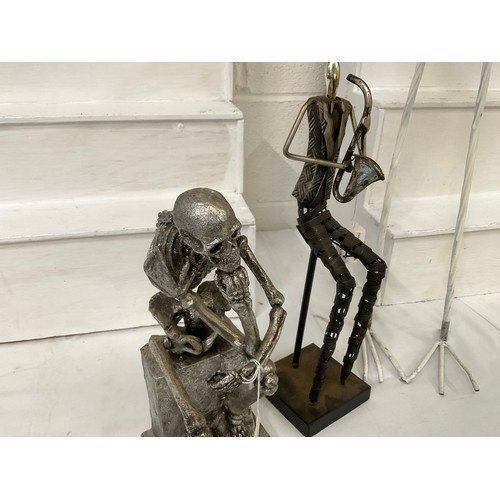 194 - 3 METAL SCUPLTURES BIRD,SKELETON,MUSICIAN