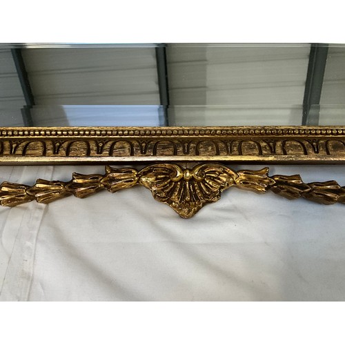 242 - MODERN DECORATIVE GILT WALL MIRROR 30”X36”